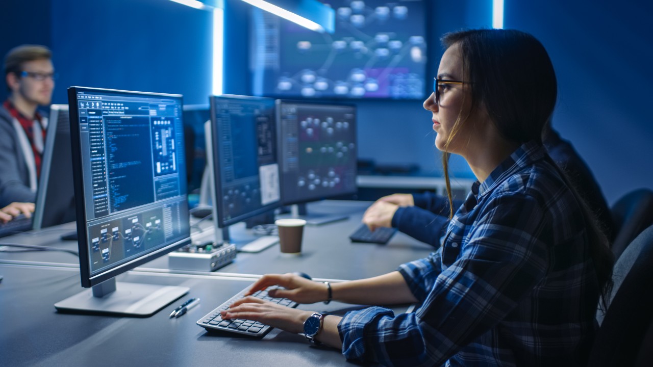 Young woman at computer. 